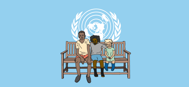 Three children seated on a bench with the flag of the United Nations in the background.